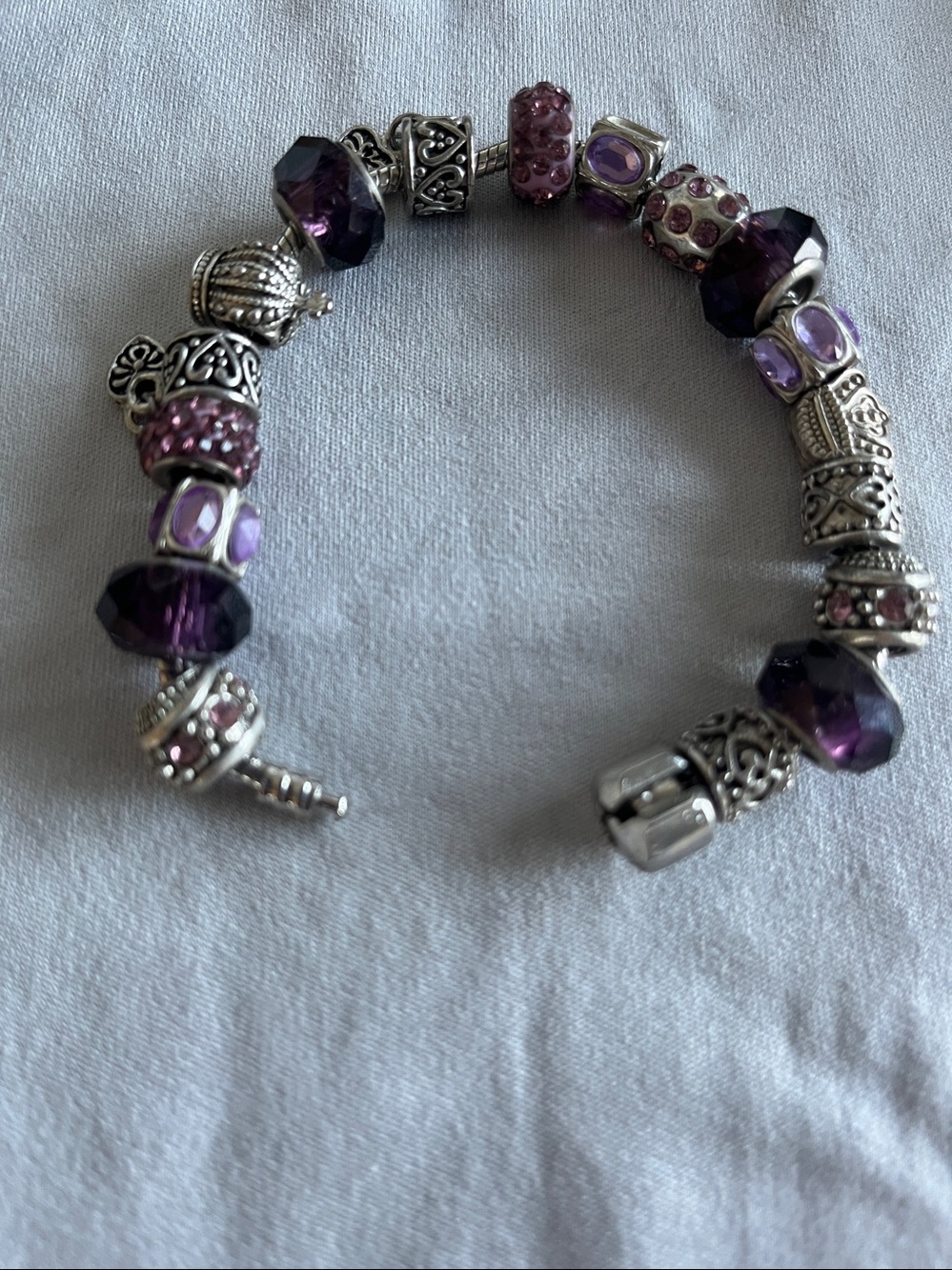Purple beads, crystals, silver hearts and charms Bracelet